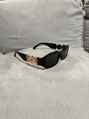 black and gold sun glasses